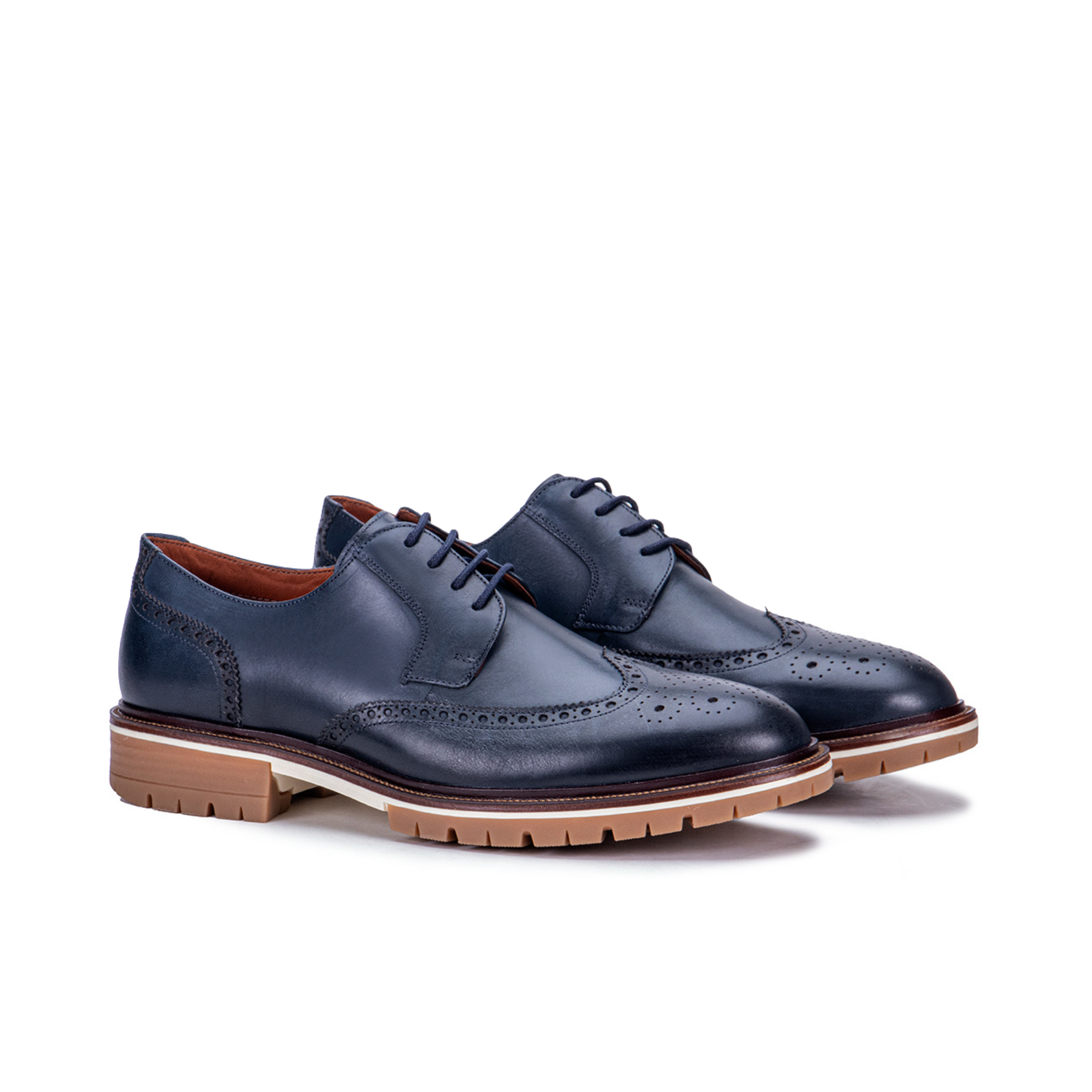 Front angle of the Artelio Fifth Avenue navy blue leather wingtip derby with lace-up styling and brogue detail