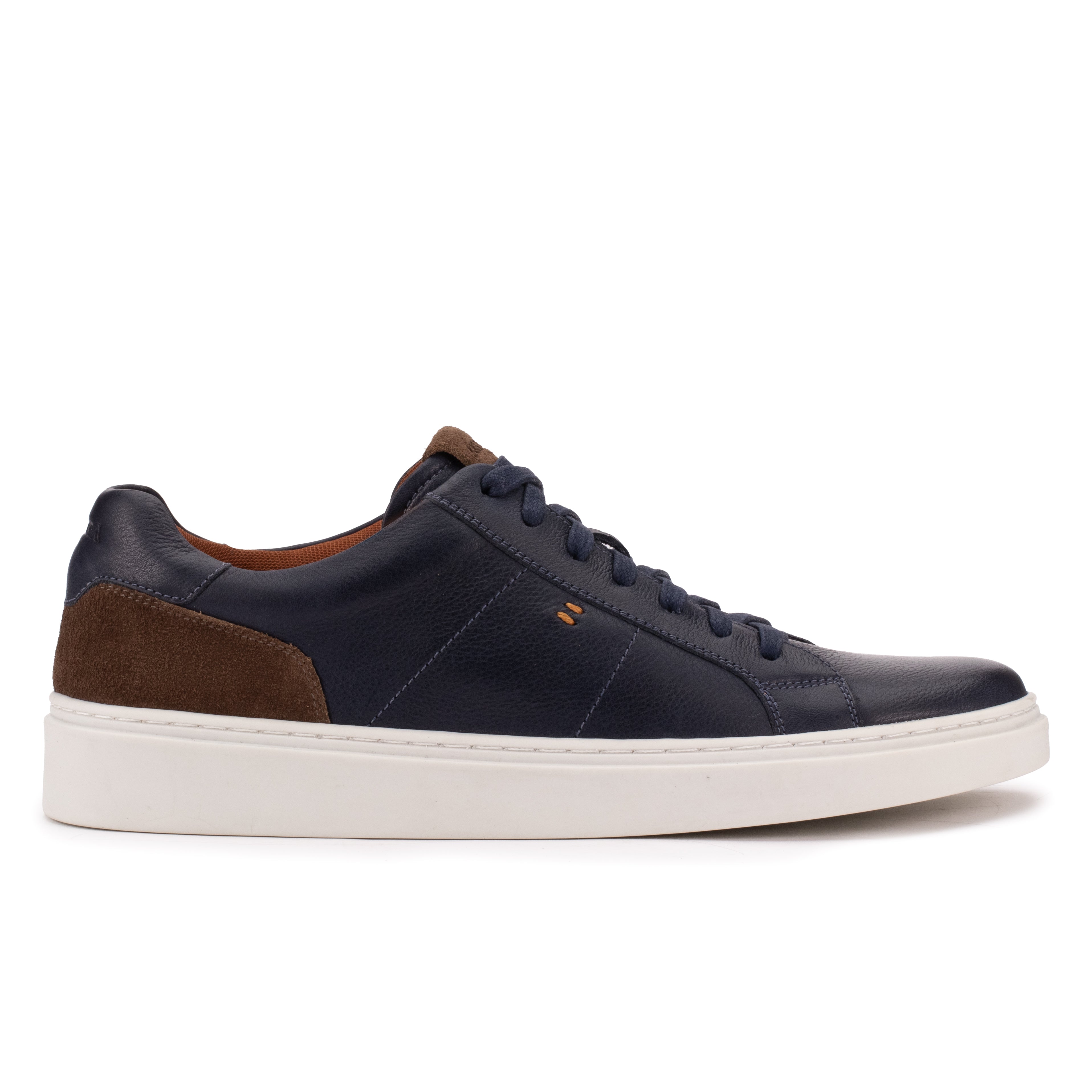 Side profile of the Artelio Heritage indigo and chocolate leather sneaker with a clean low-top shape and grippy rubber sole