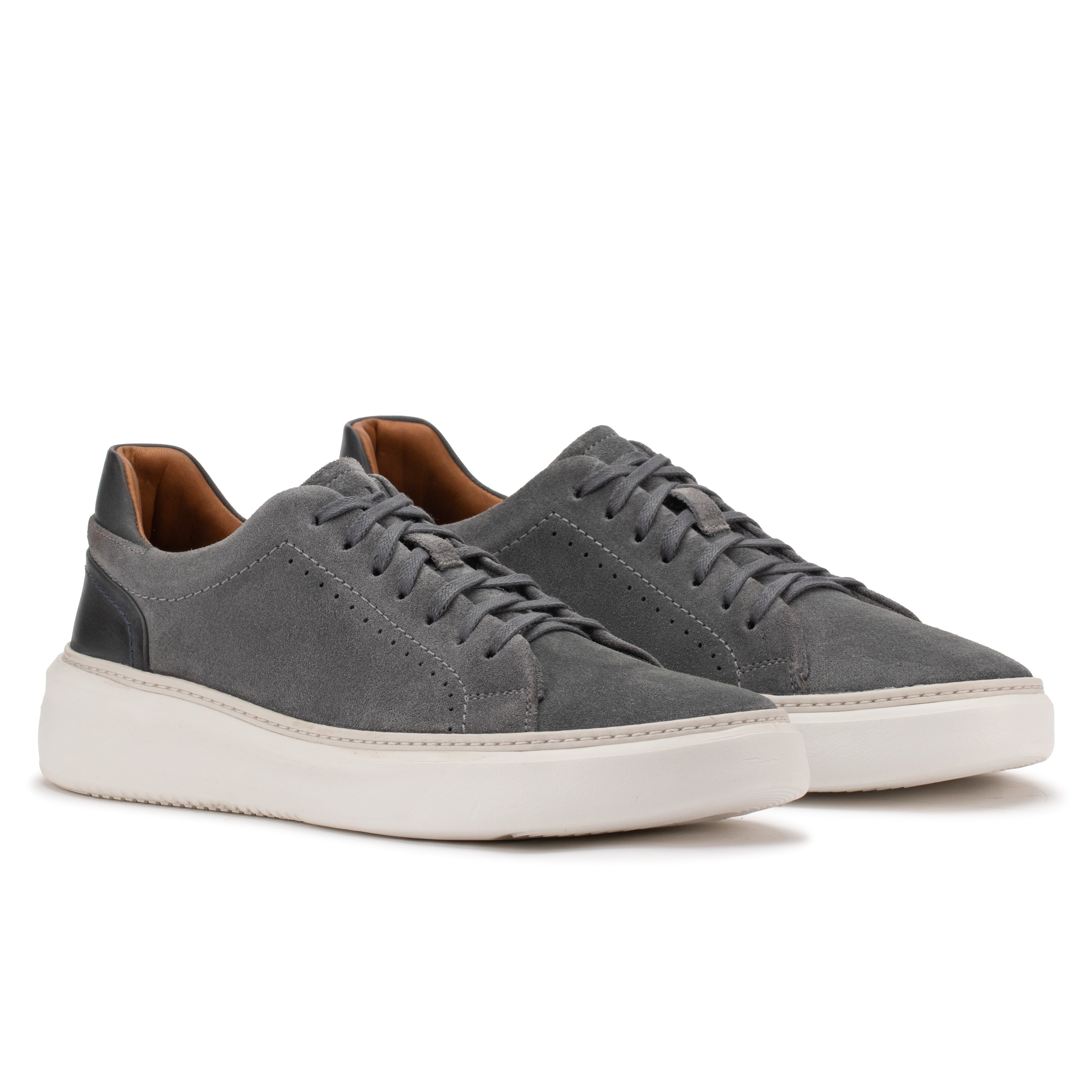 Front angle of the Artelio Riviera 2.0 dark gray suede sneaker showing the low-profile lace-up shape