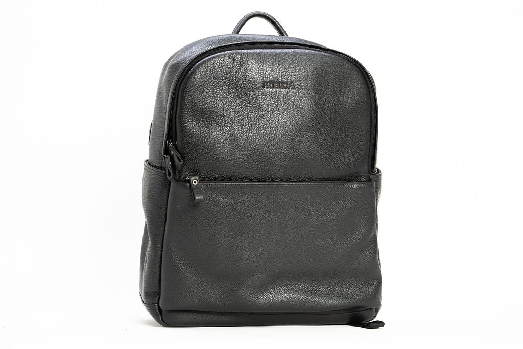 Front view of the Artelio black leather backpack with a zippered front pocket and top carry handle