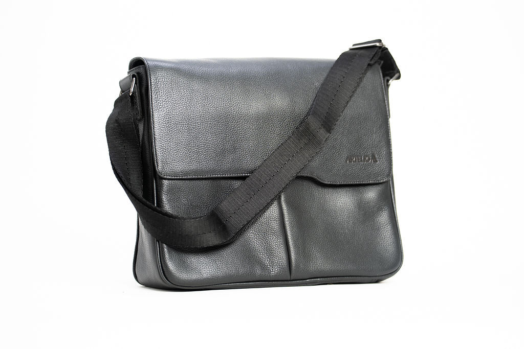 Front angle of the Artelio black leather crossbody bag with flap closure and adjustable strap