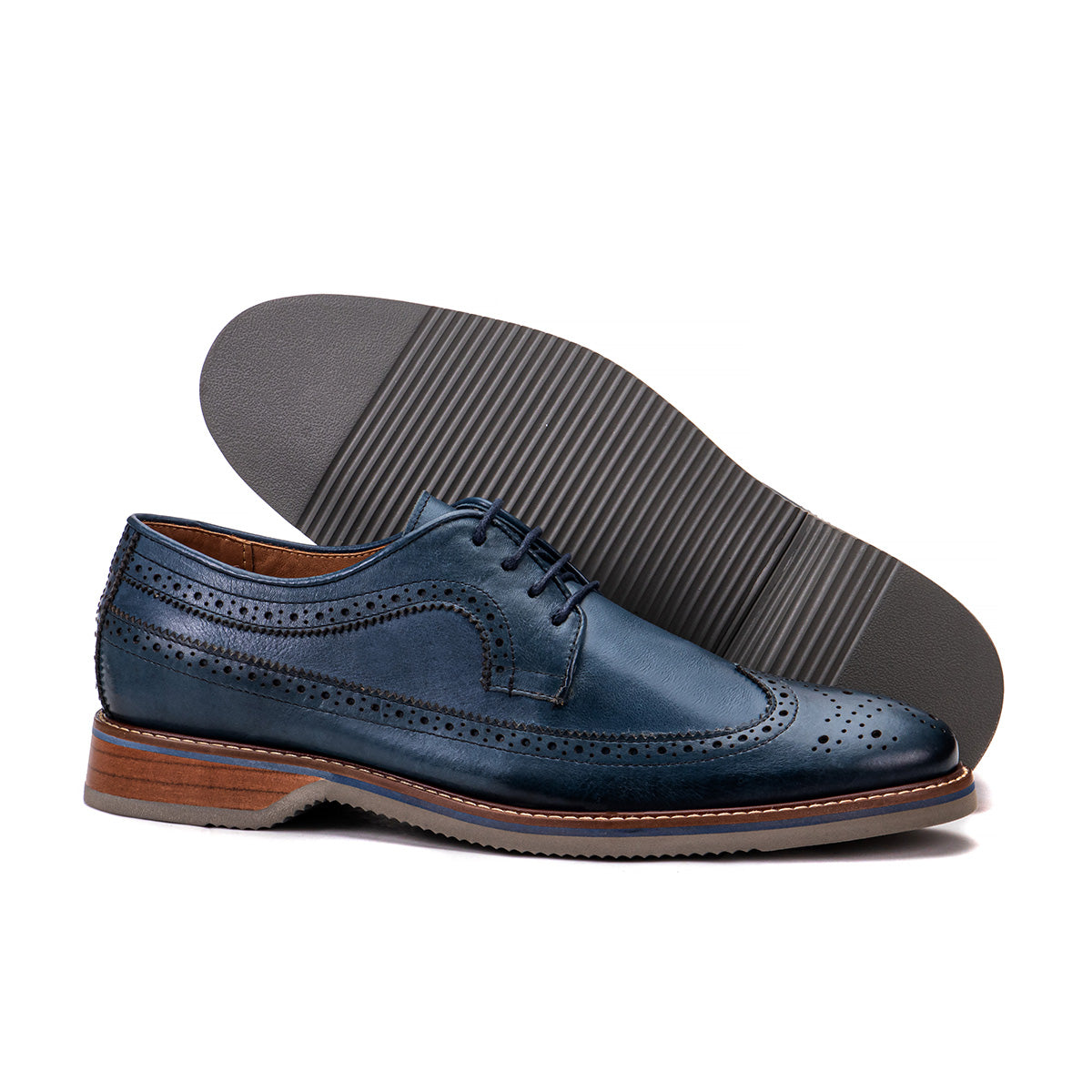 Sole detail of The Brasilia blue leather wingtip brogue derby showing the lightweight non-slip bottom