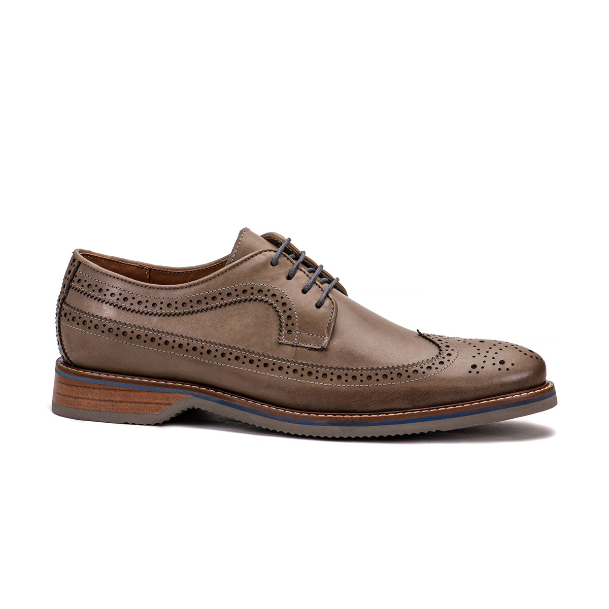 Side profile of The Brasilia foggy gray leather wingtip brogue derby with layered sole and hand-stitched welt detail