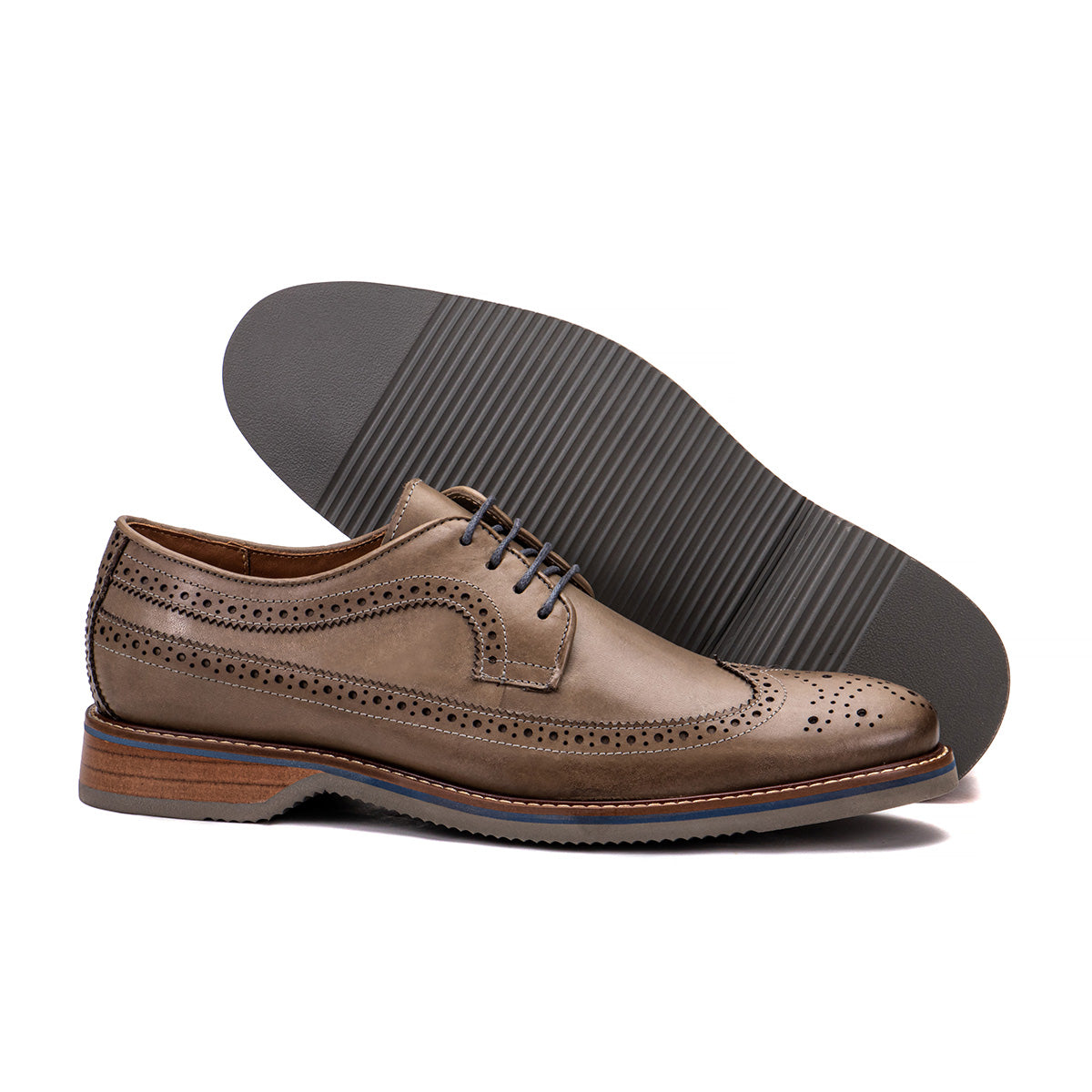 Sole detail of The Brasilia foggy gray leather wingtip brogue derby showing the lightweight non-slip bottom