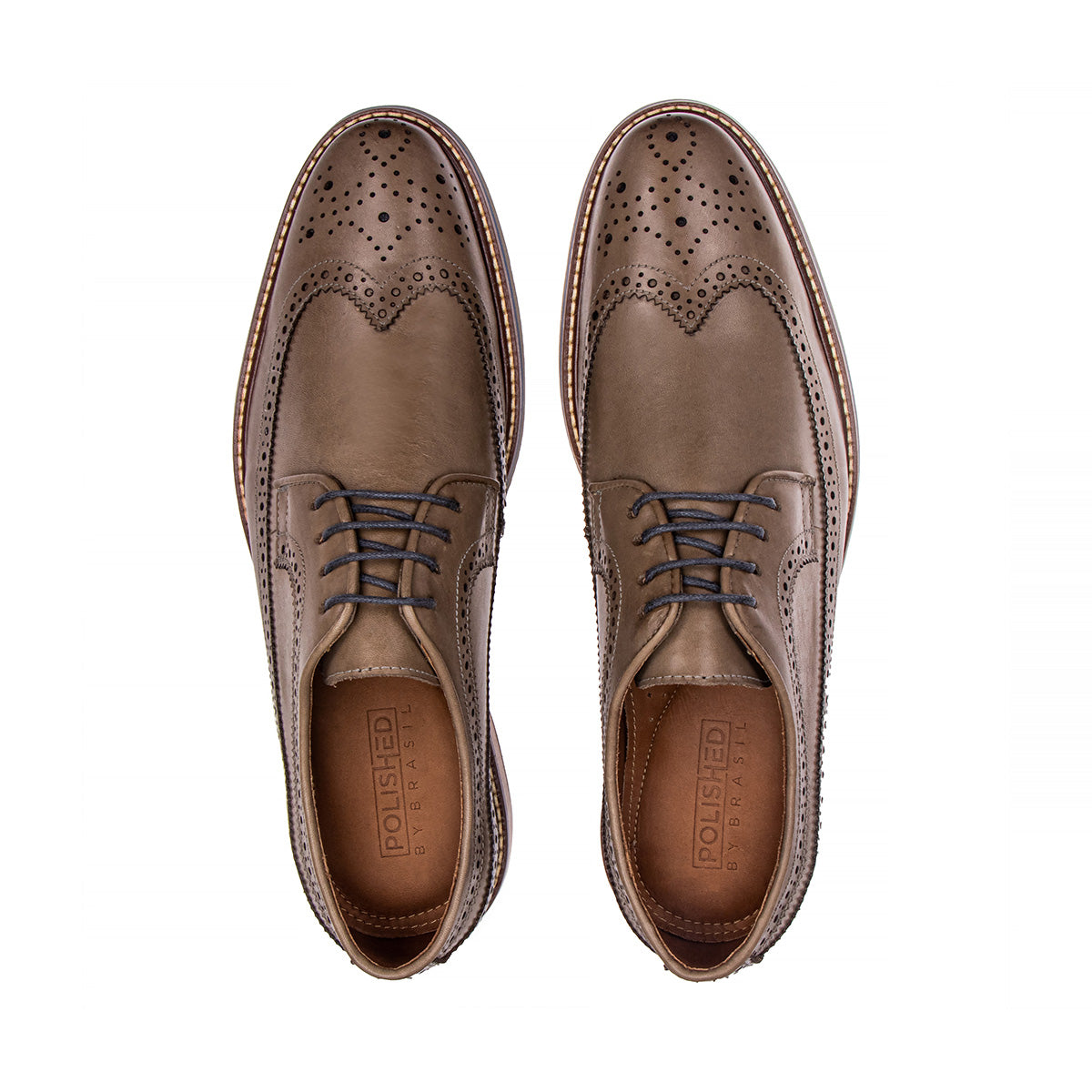 Top view of The Brasilia foggy gray leather wingtip brogue derby showing laces and brogue detailing