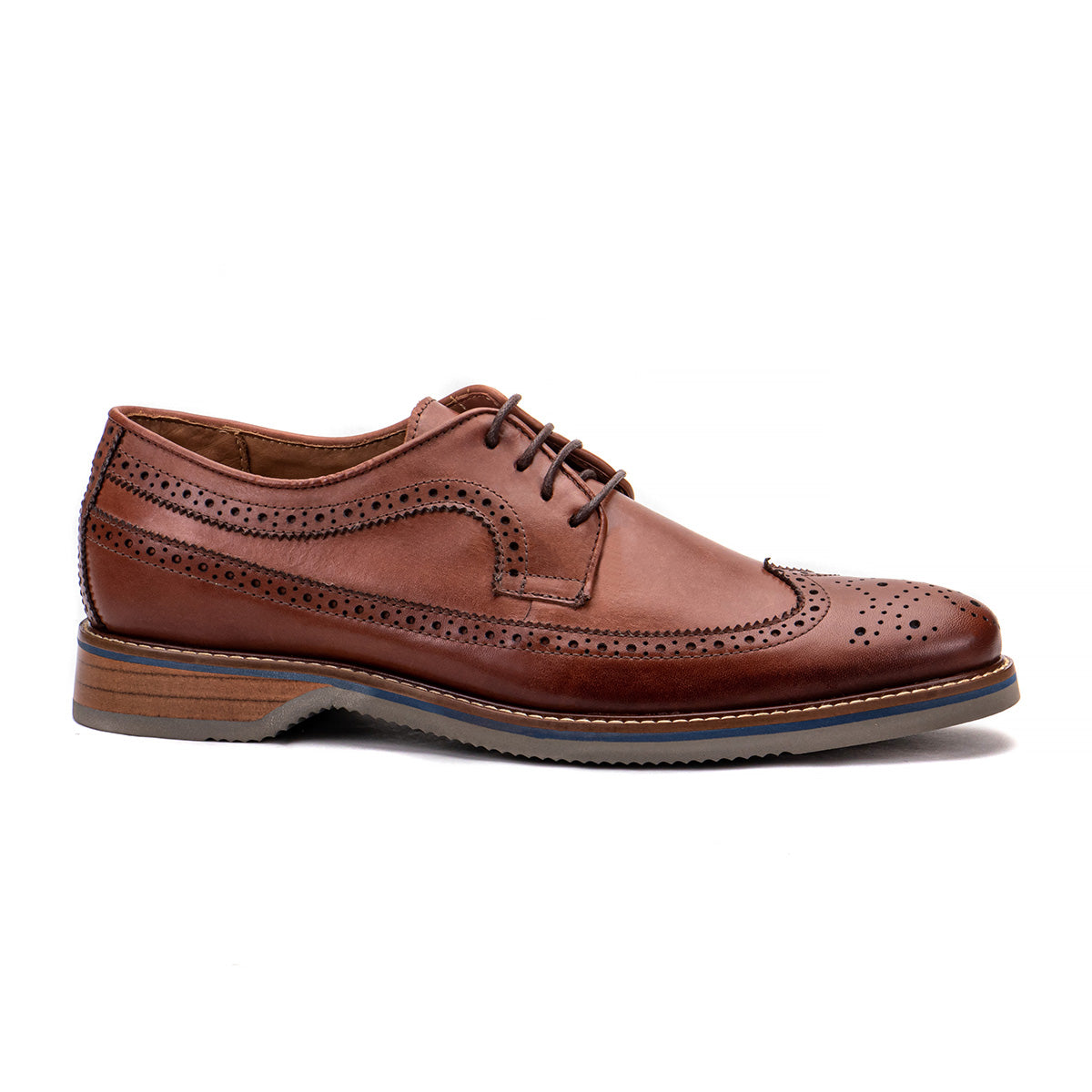 Side profile of The Brasilia terracotta leather wingtip brogue derby with layered sole and hand-stitched welt detail