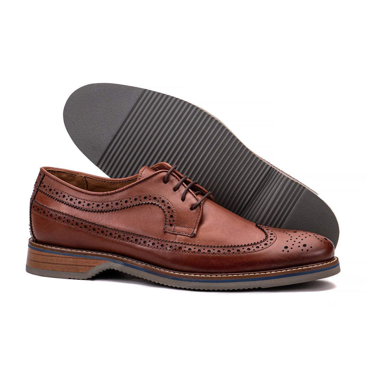 Sole detail of The Brasilia terracotta leather wingtip brogue derby showing the lightweight non-slip bottom
