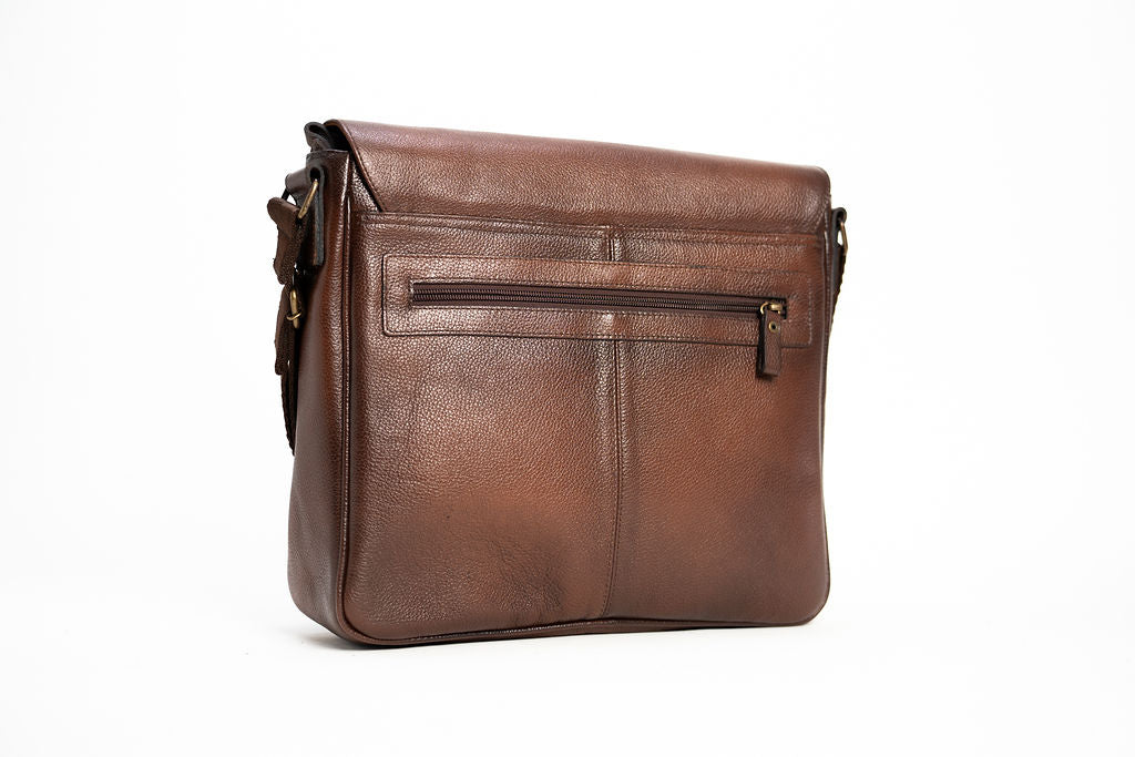 Rear angle of the Artelio brown leather crossbody bag showing the exterior zippered pocket