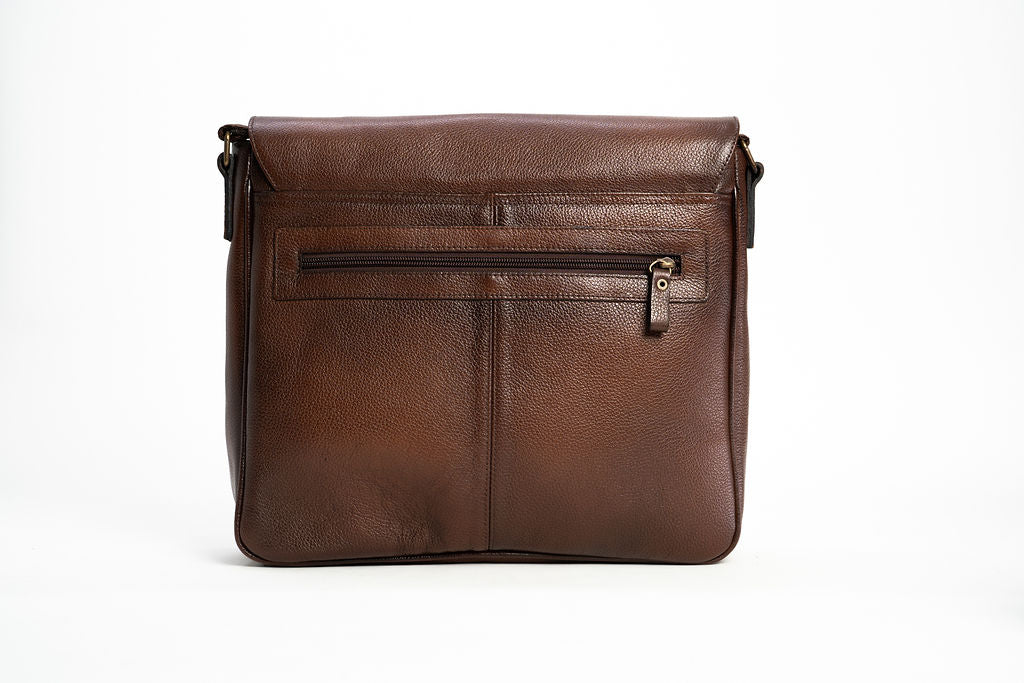 Alternate rear view of the Artelio brown leather crossbody bag with its exterior zippered pocket