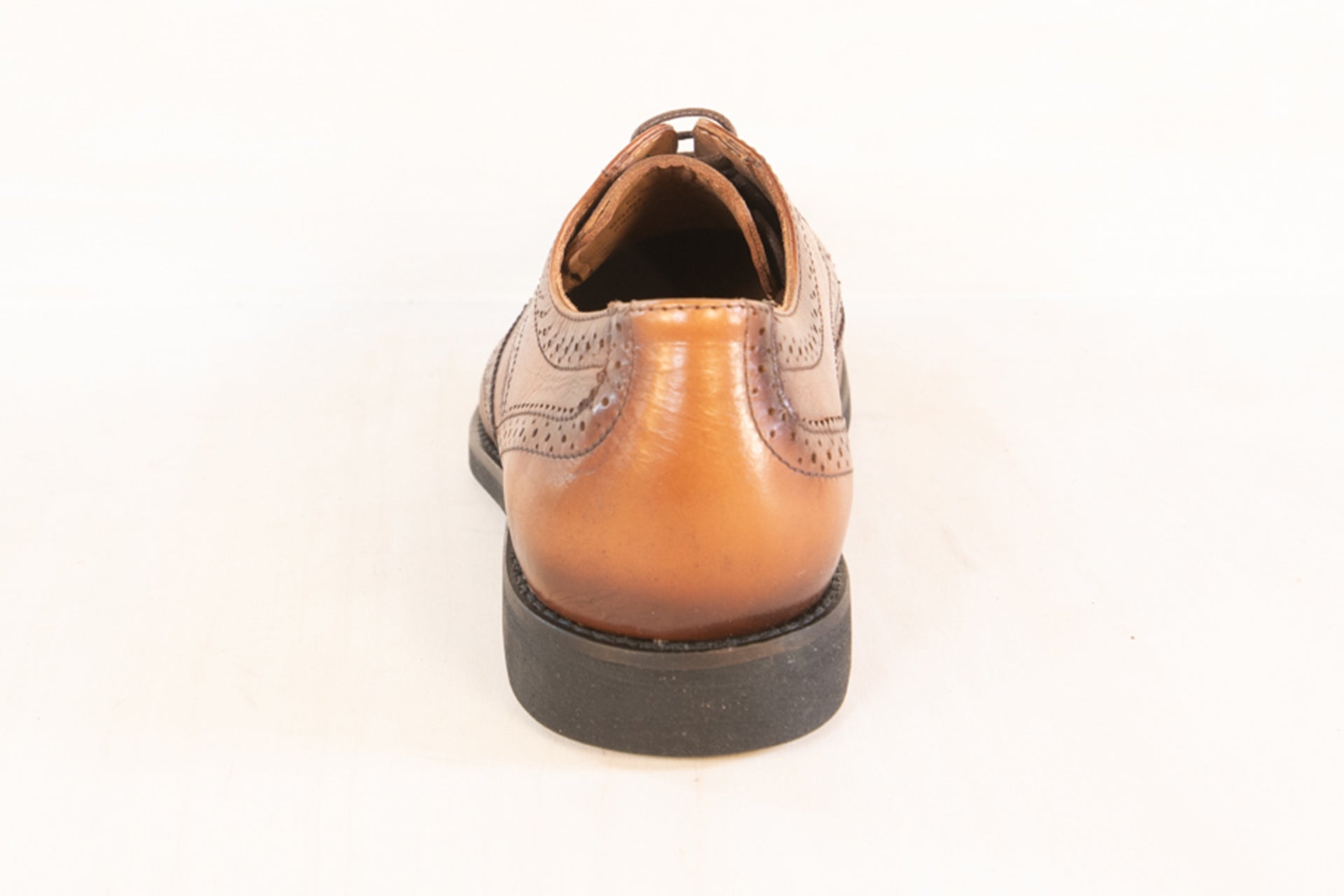 Rear angle of the Artelio Classico bronze leather oxford dress shoe showing the heel and polished leather