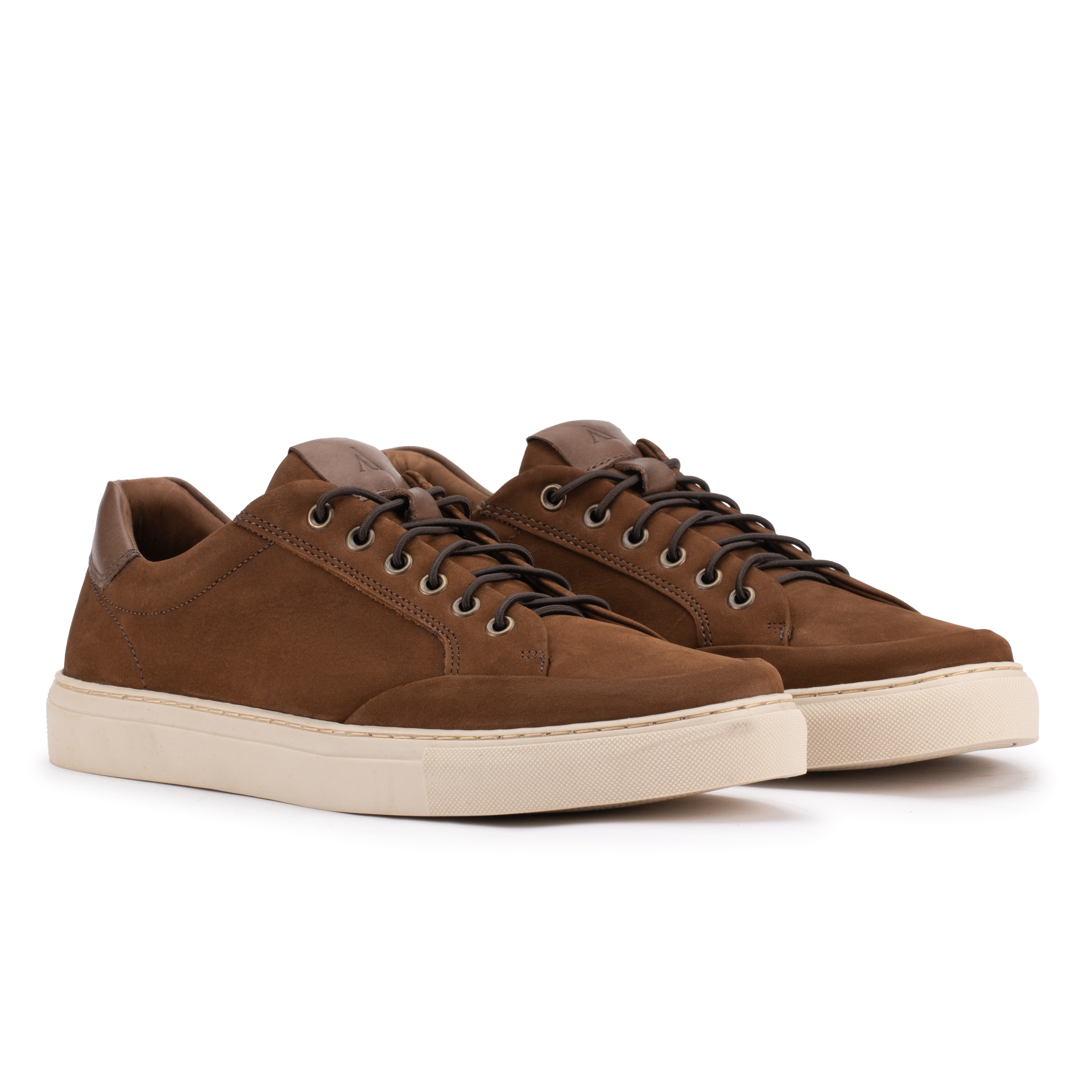 Front angle of the Artelio Elasticore cognac nubuck sneaker with elastic laces and a white sole