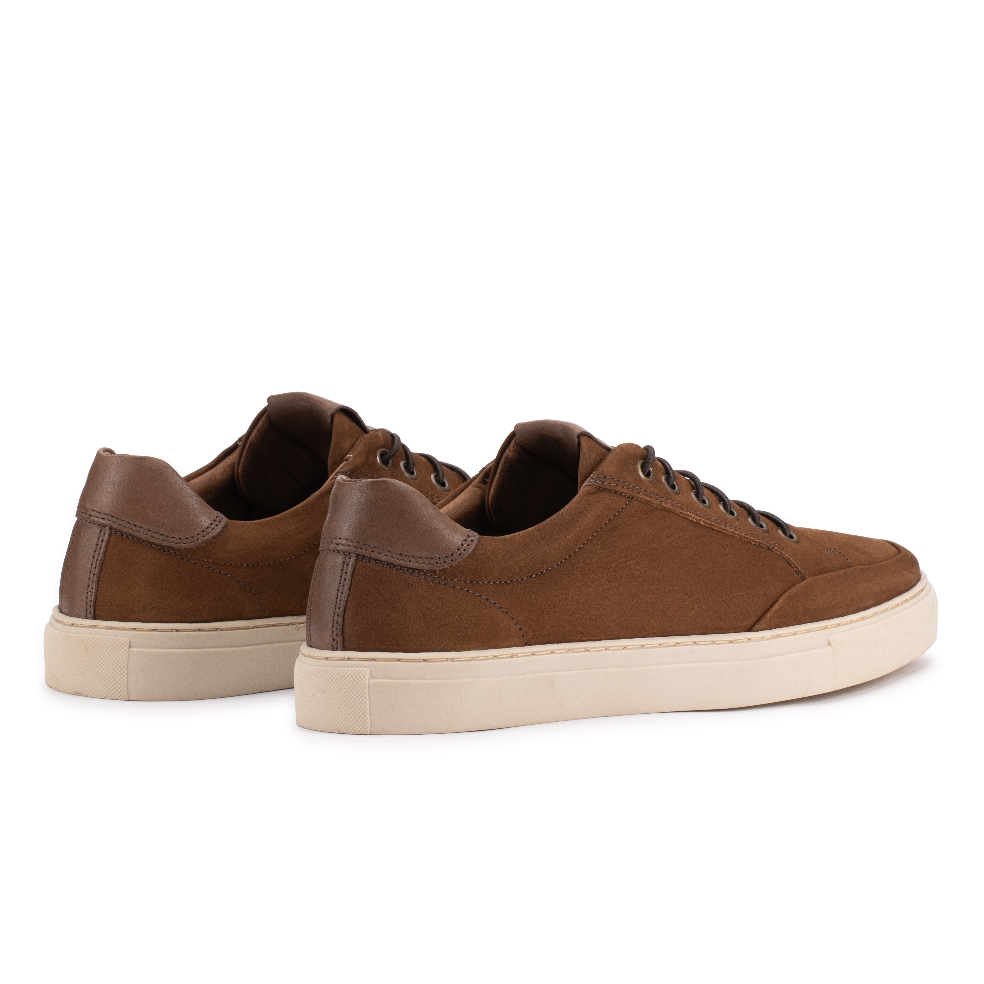 Rear angle of the Artelio Elasticore cognac nubuck sneaker showing leather heel detail