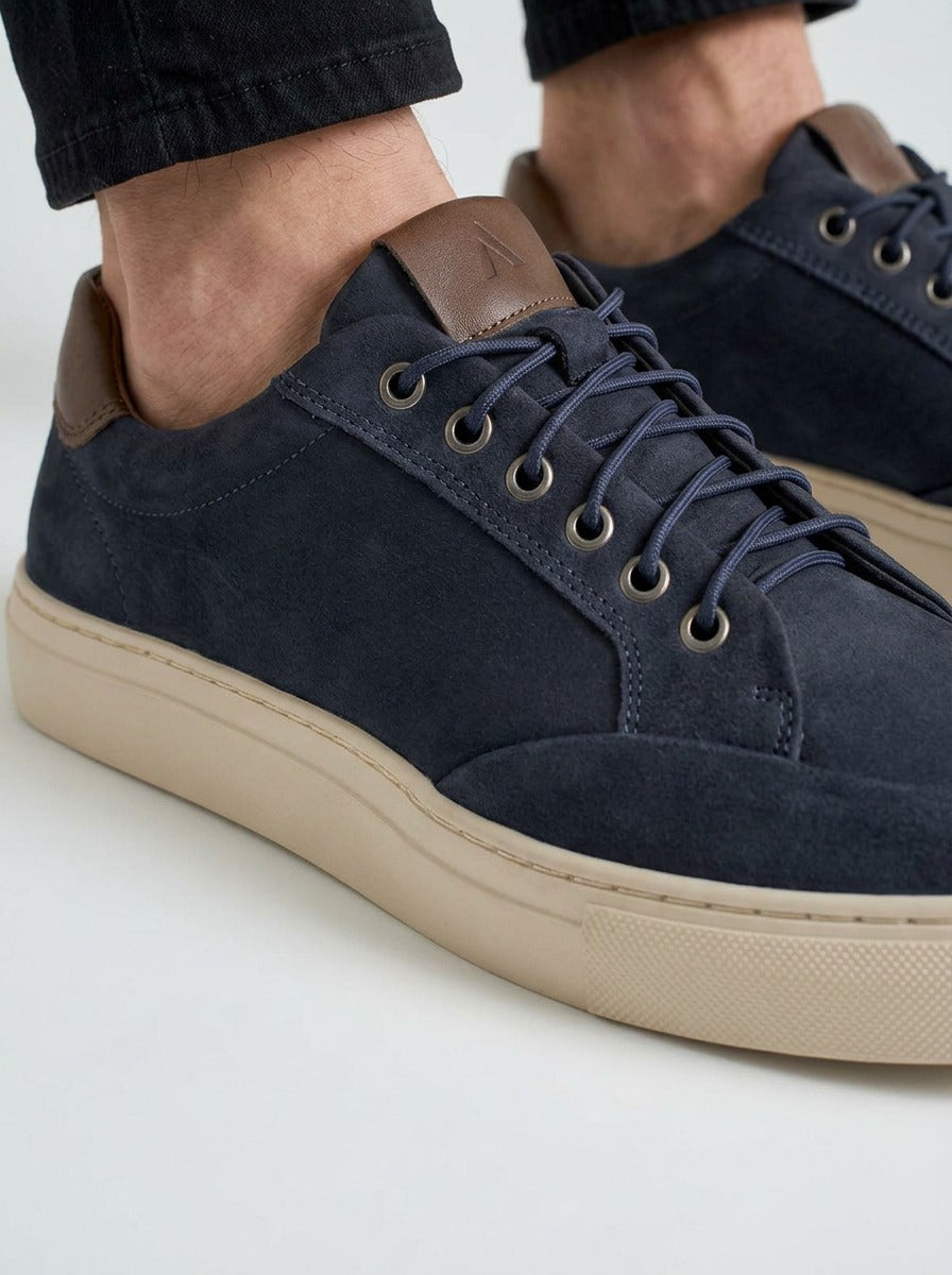 On-foot closeup of the Artelio Elasticore navy nubuck sneaker with elastic lacing
