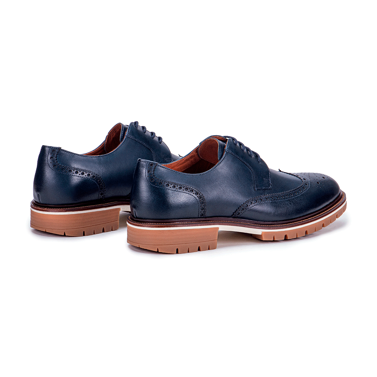 Rear angle of the Artelio Fifth Avenue navy blue leather wingtip derby showing the heel and wingtip profile