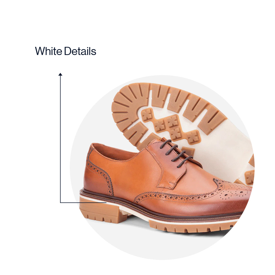 Sole detail with white of the Artelio Fifth Avenue terracotta leather wingtip derby with a cushioned everyday sole