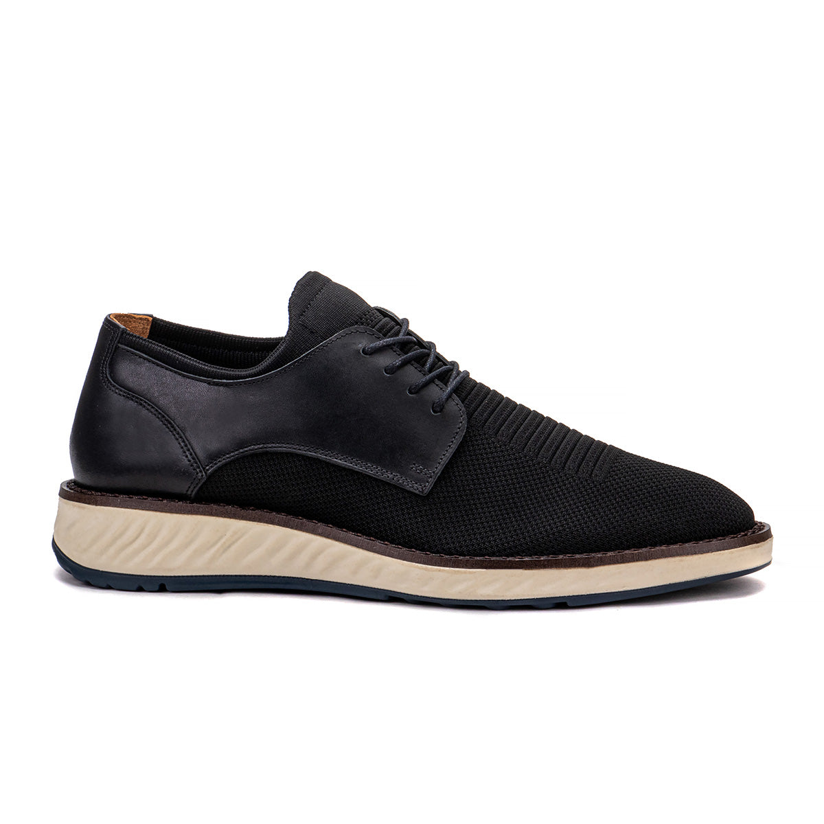 Side profile of the Artelio Fusion black knit casual shoe showing the knit upper and comfort sole