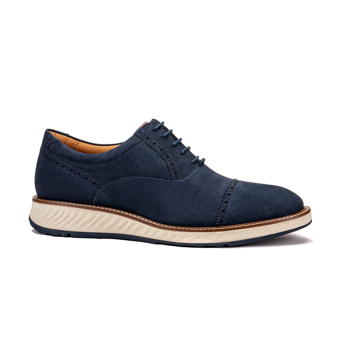 Side profile of the Artelio Greenville navy blue nubuck cap-toe oxford with subtle brogue detail and a white cushioned sole