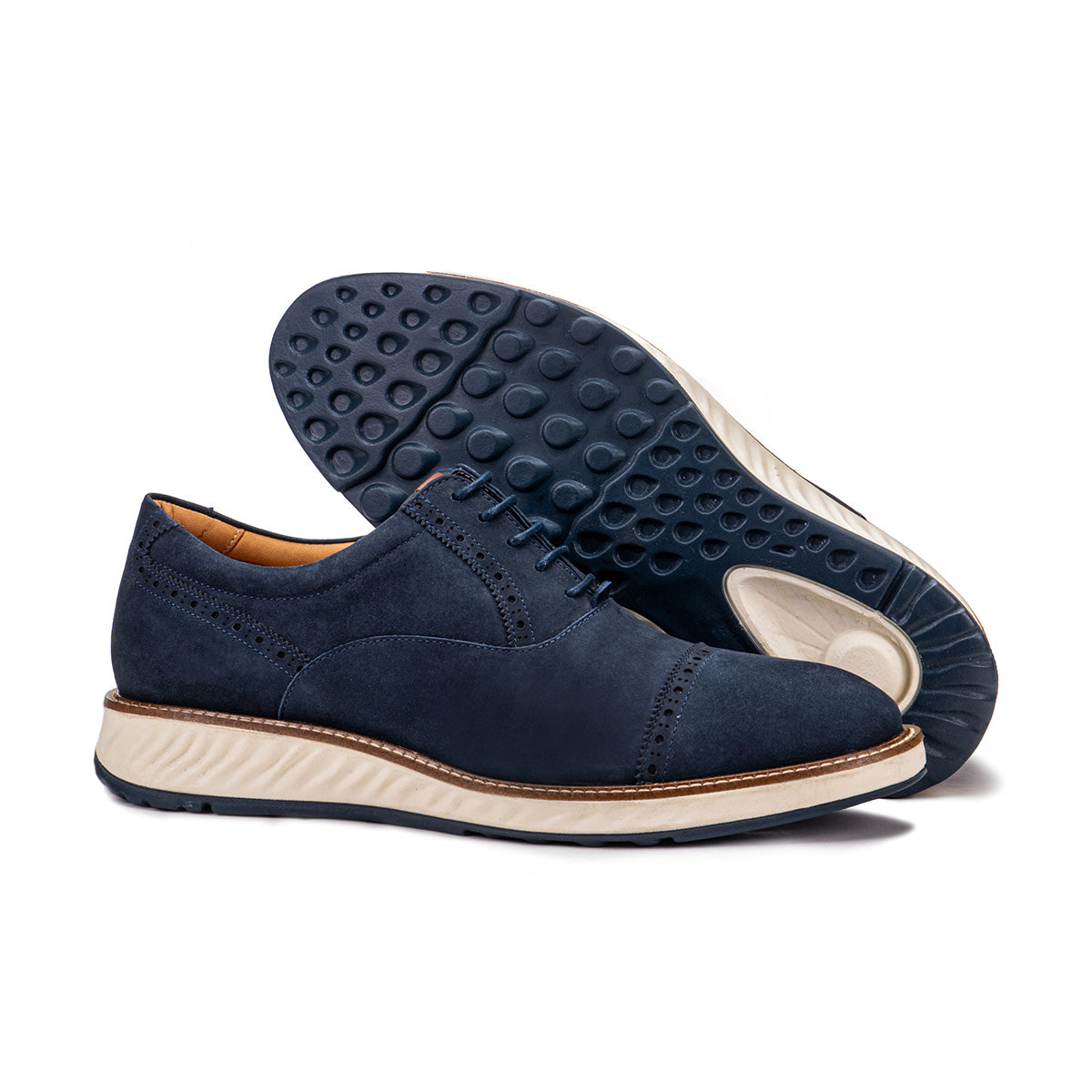 Sole detail of the Artelio Greenville navy blue nubuck oxford showing the cushioned white sole