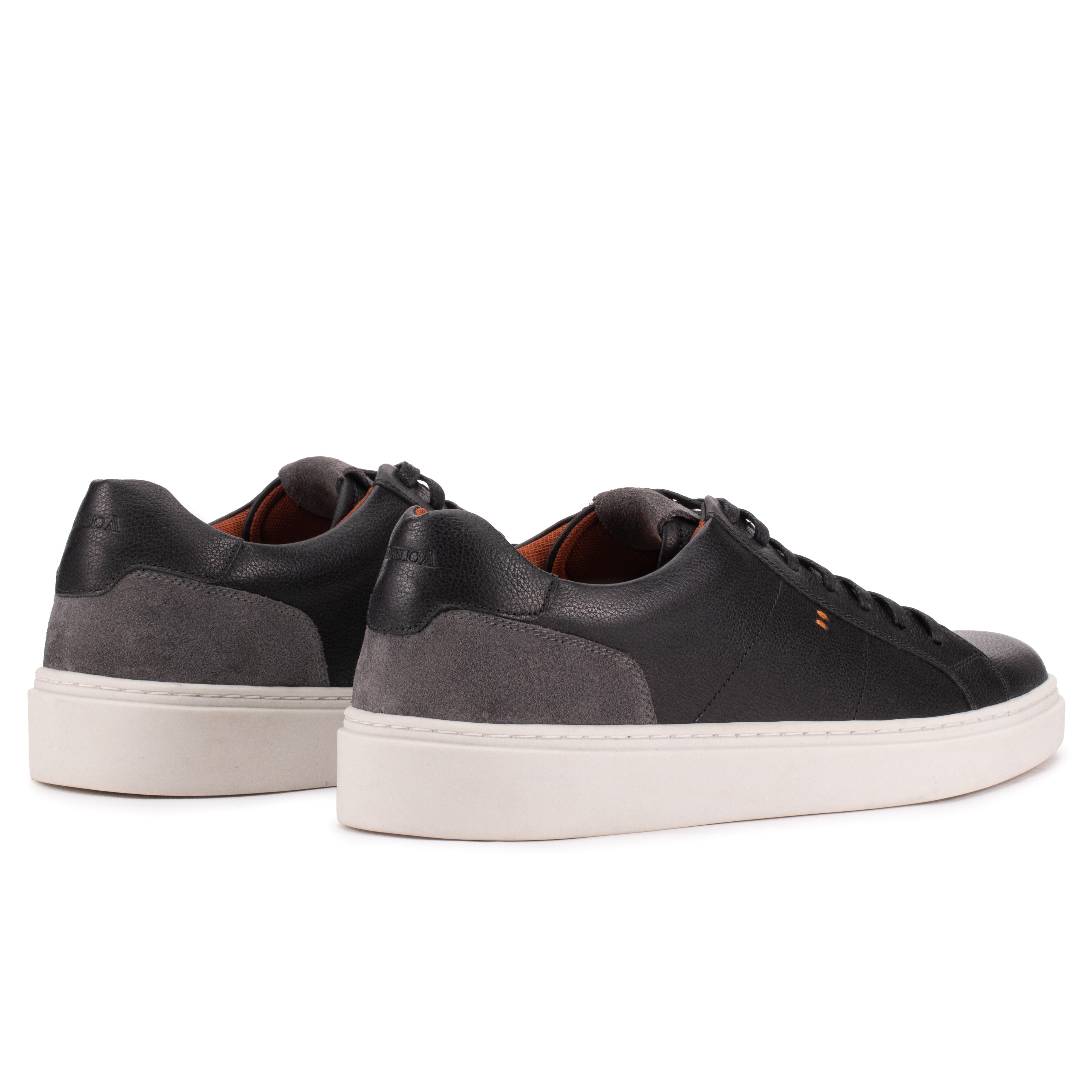 Rear angle of the Artelio Heritage black and gray leather sneaker showing the suede heel detail