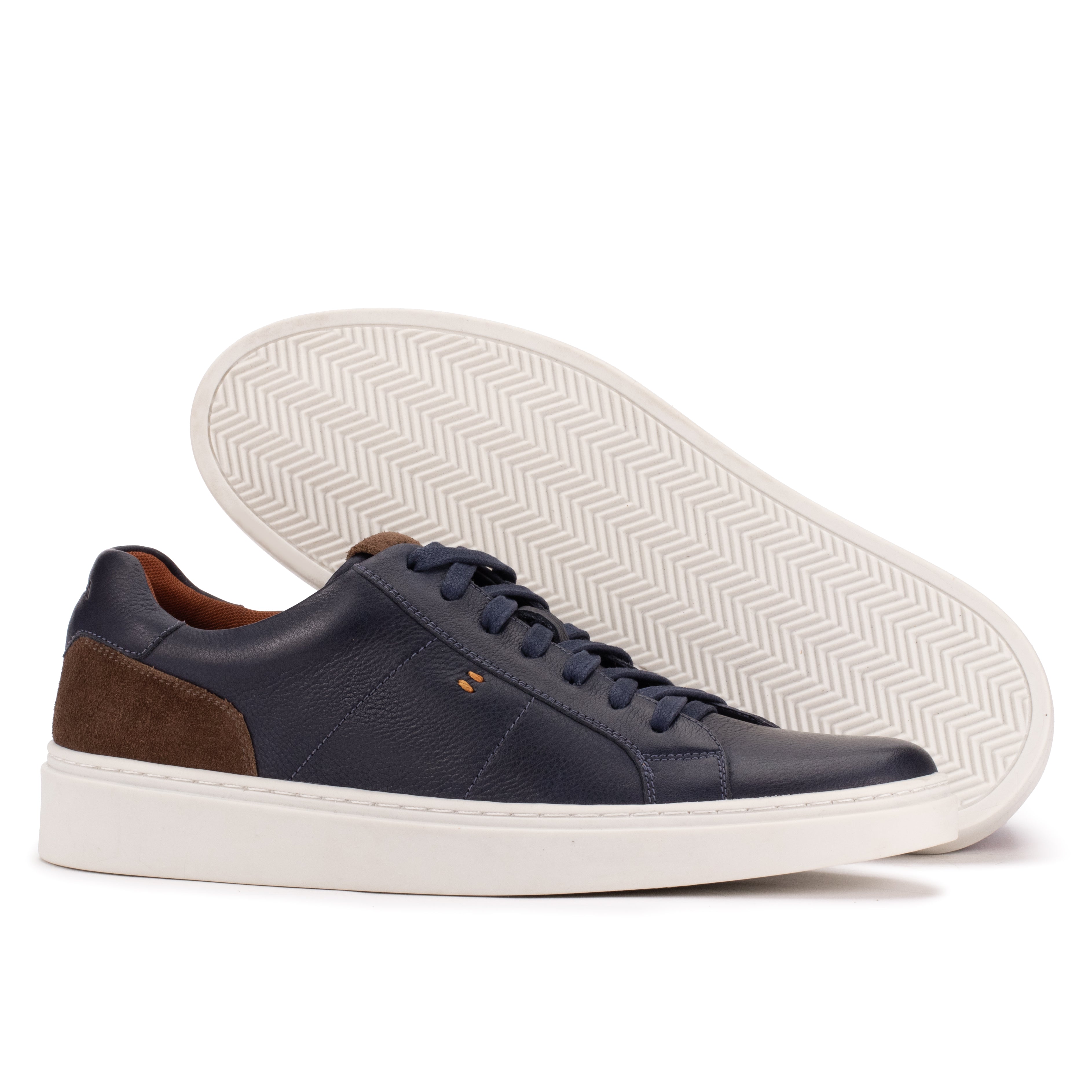 Sole detail of the Artelio Heritage indigo and chocolate leather sneaker with a grippy rubber sole