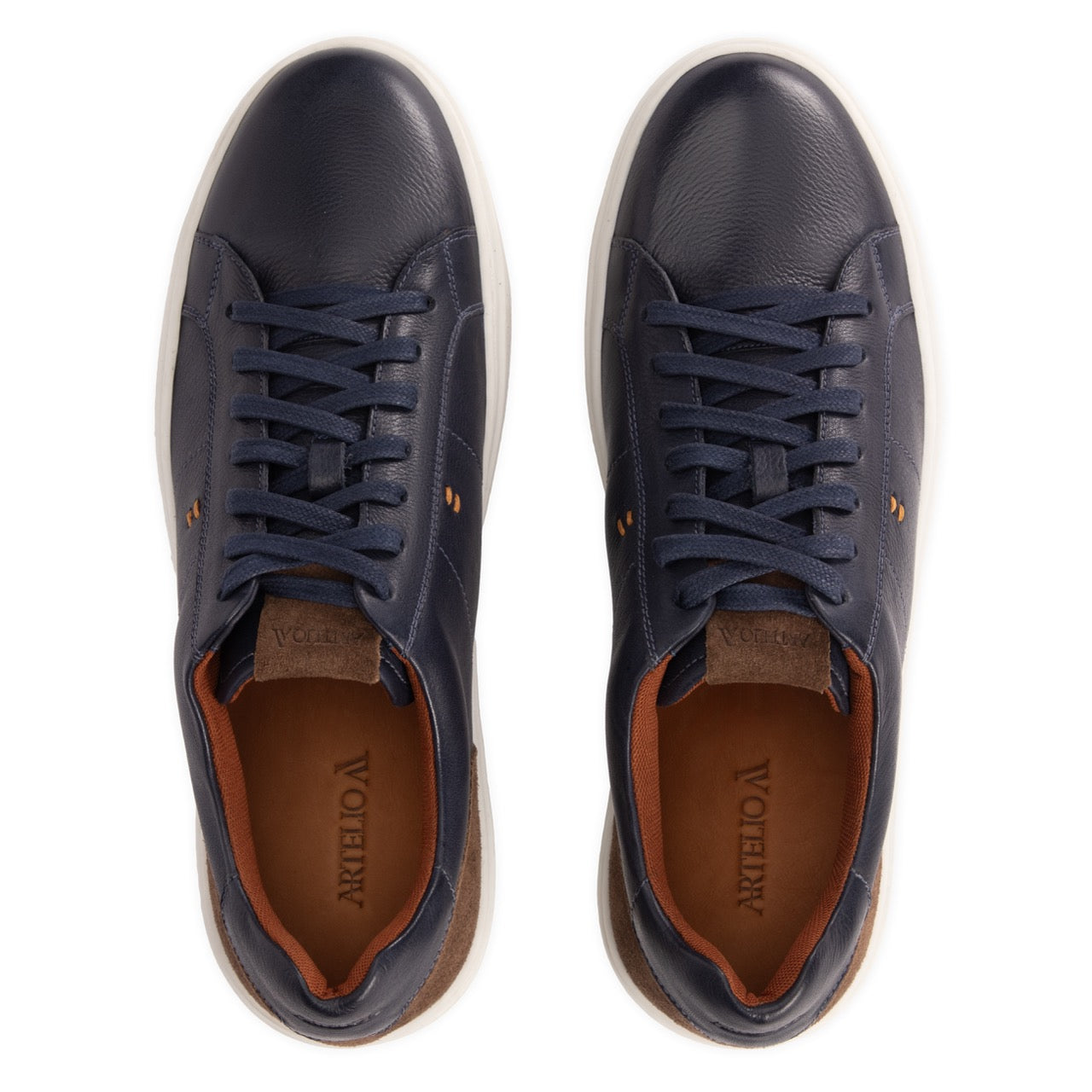 Top view of the Artelio Heritage indigo and chocolate leather low-top sneaker with suede tongue and heel detail