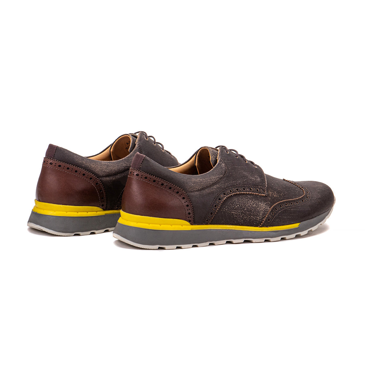 Rear angle of the Artelio Neapolitan brushed tobacco leather wingtip brogue shoe showing the heel and brushed leather finish