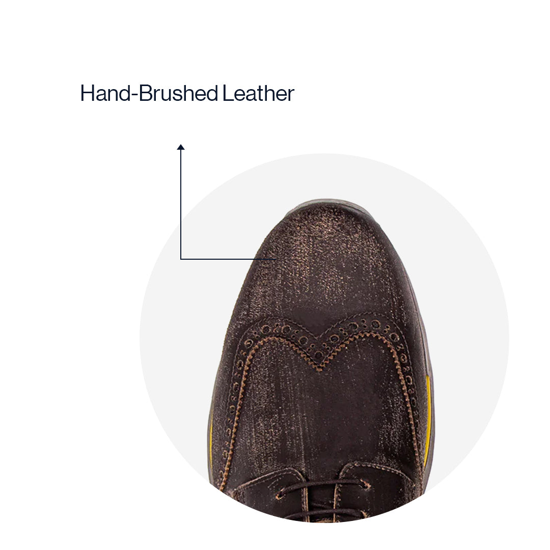 Sole detail of the Artelio Neapolitan brushed tobacco leather wingtip brogue shoe showing the flexible bottom