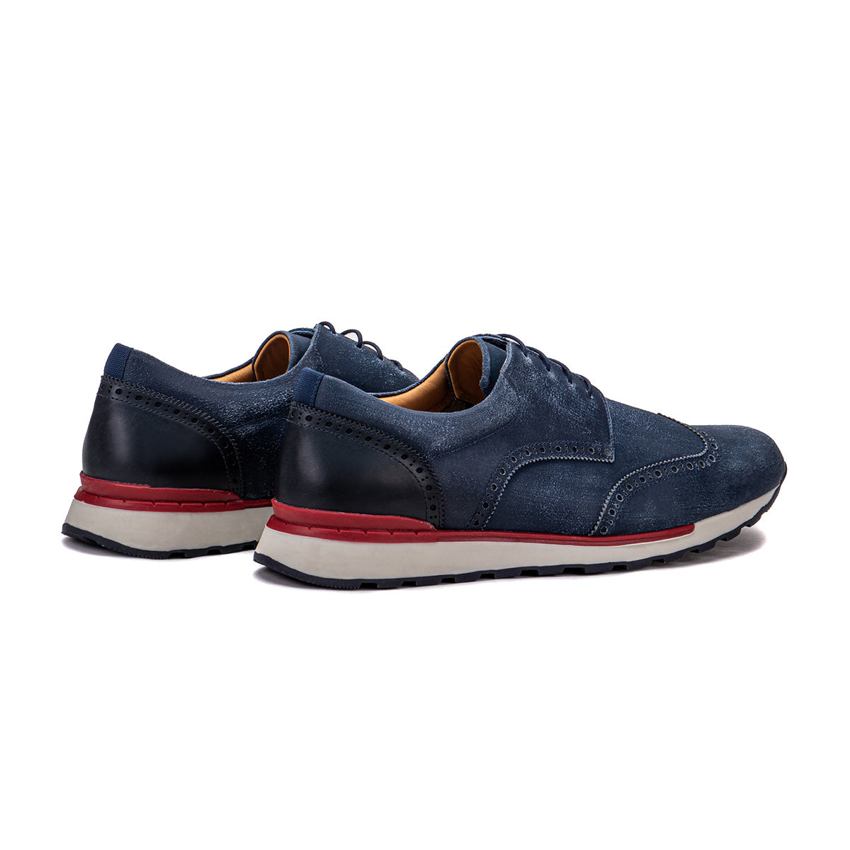 Rear angle of the Artelio Neapolitan navy leather wingtip brogue shoe showing the heel and brushed leather finish