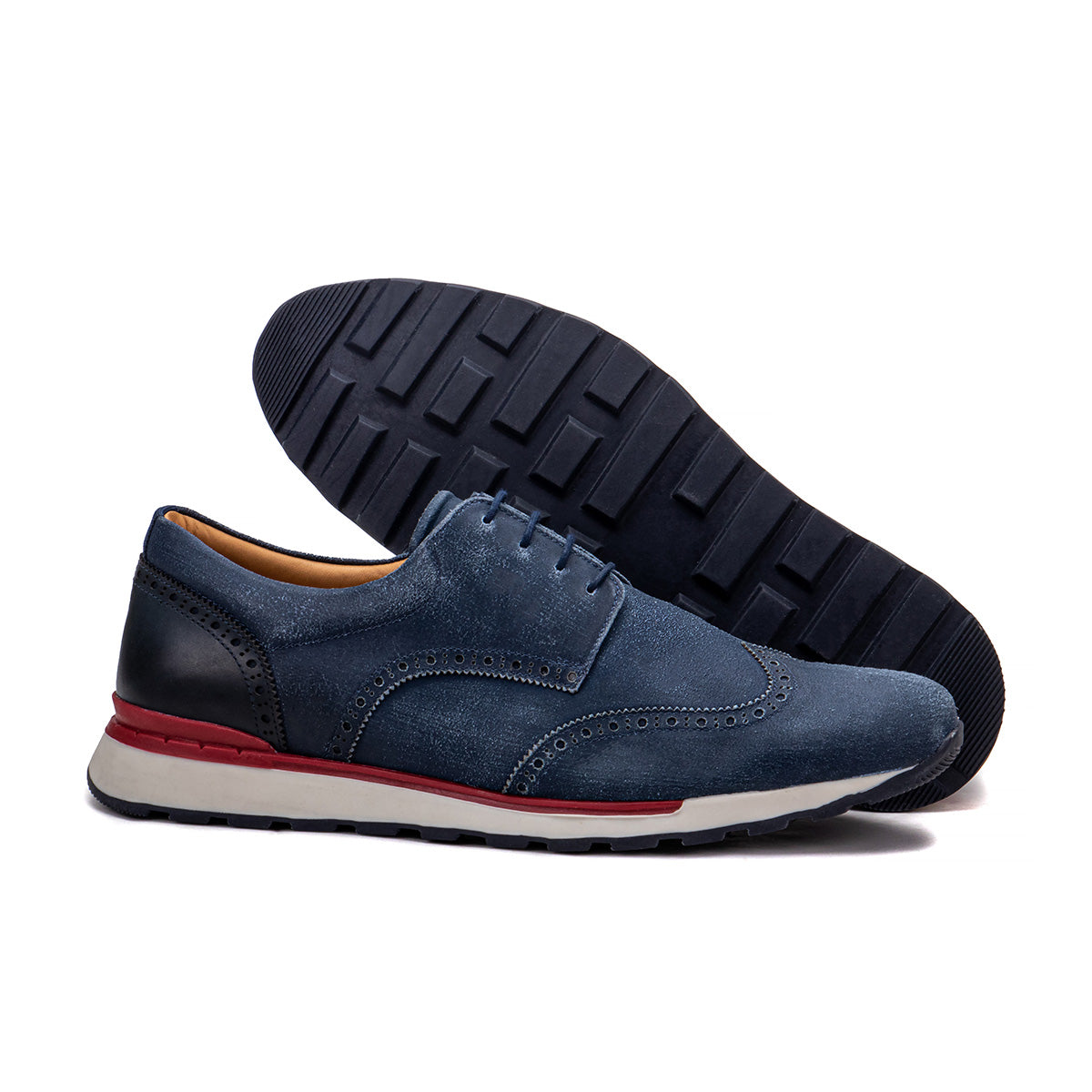 Sole detail of the Artelio Neapolitan navy leather wingtip brogue shoe showing the flexible bottom