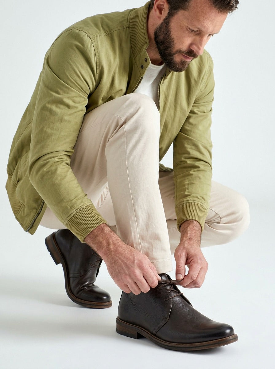 Lacing detail of the Artelio New Siena rich brown leather chukka boot being tied