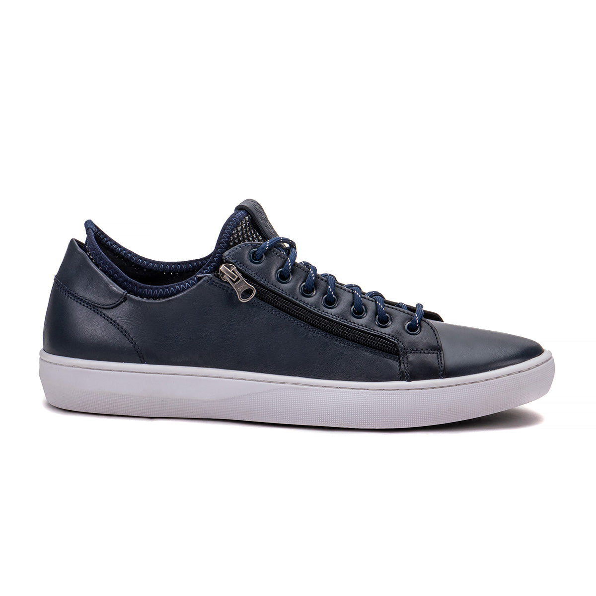 Side profile of the Artelio Pikes Peak navy leather side-zip sneaker showing the leather upper and side zipper