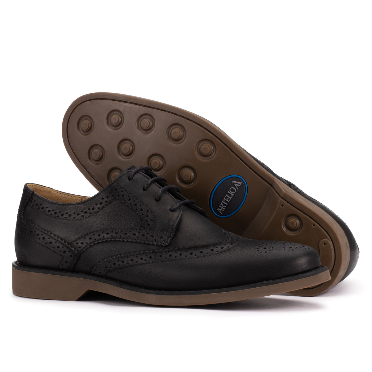Lifestyle view of the Artelio Santiago classic black leather wingtip derby styled for dress-casual wear