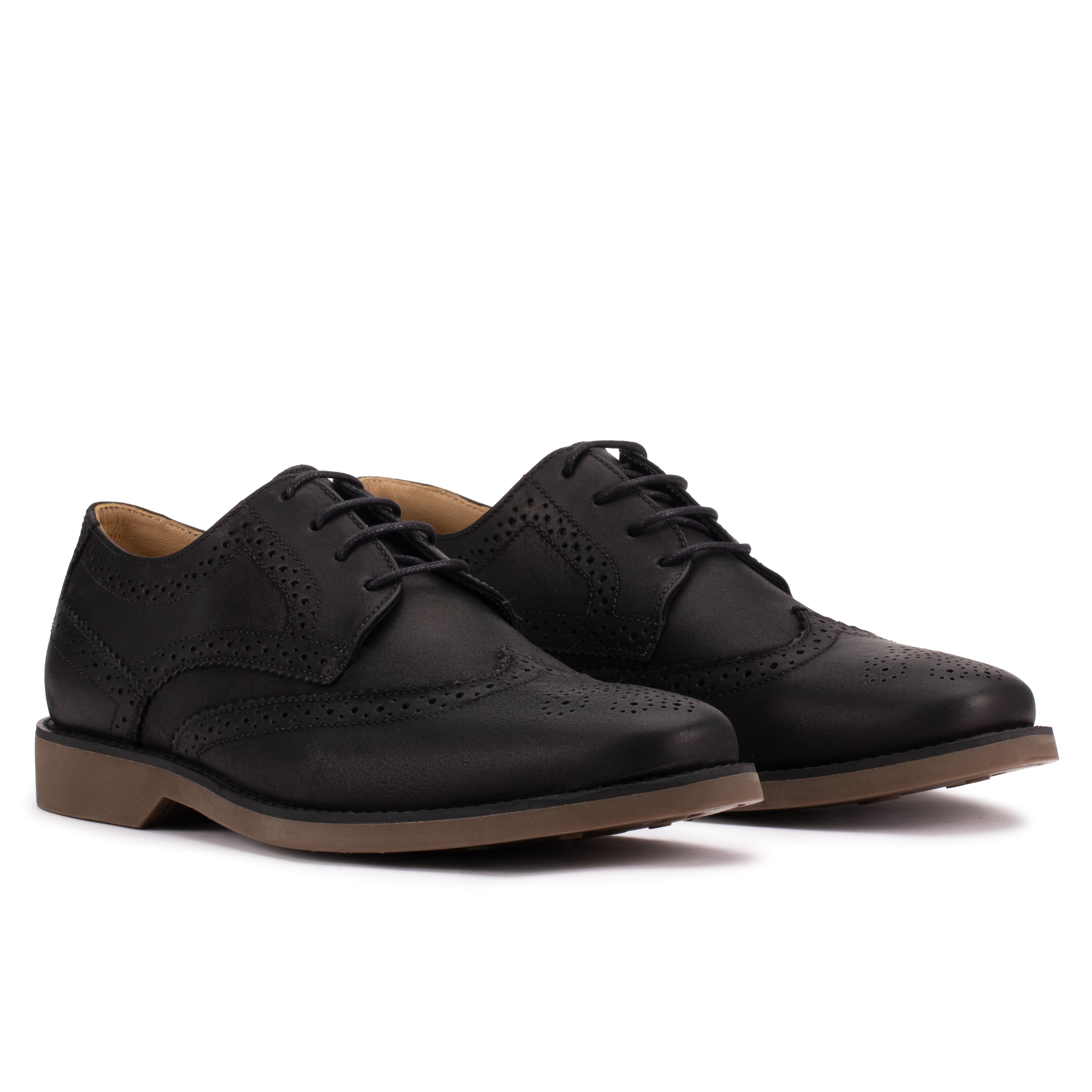 Angled view of the Artelio Santiago classic black leather wingtip derby showing leather upper and sole profile
