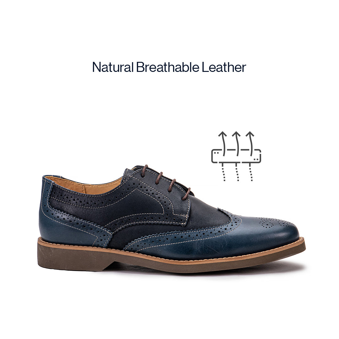 Lifestyle view of the Artelio Santiago navy blue leather wingtip derby styled for dress-casual wear