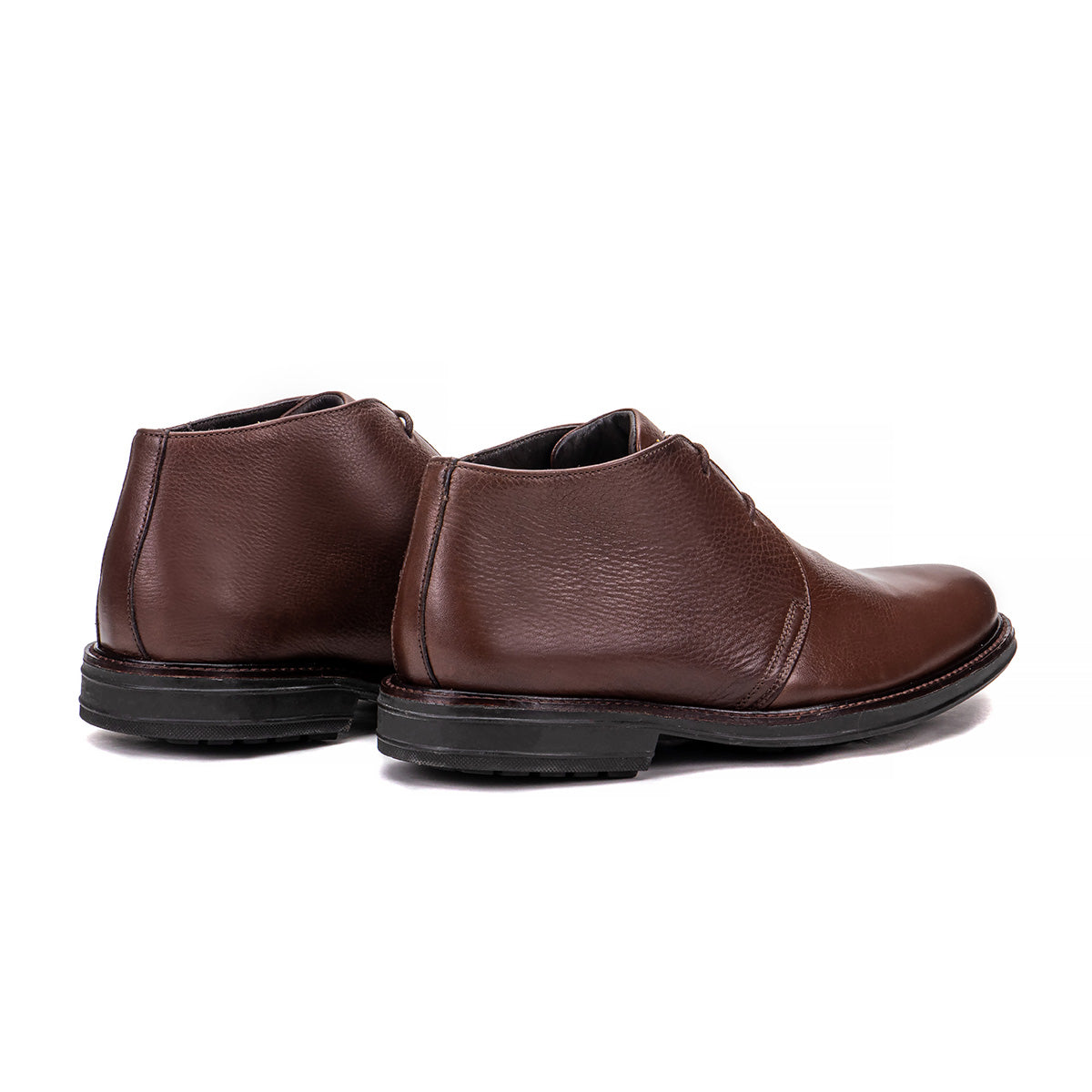 Rear angle of the Artelio Siena brown leather chukka boot showing the heel and leather upper