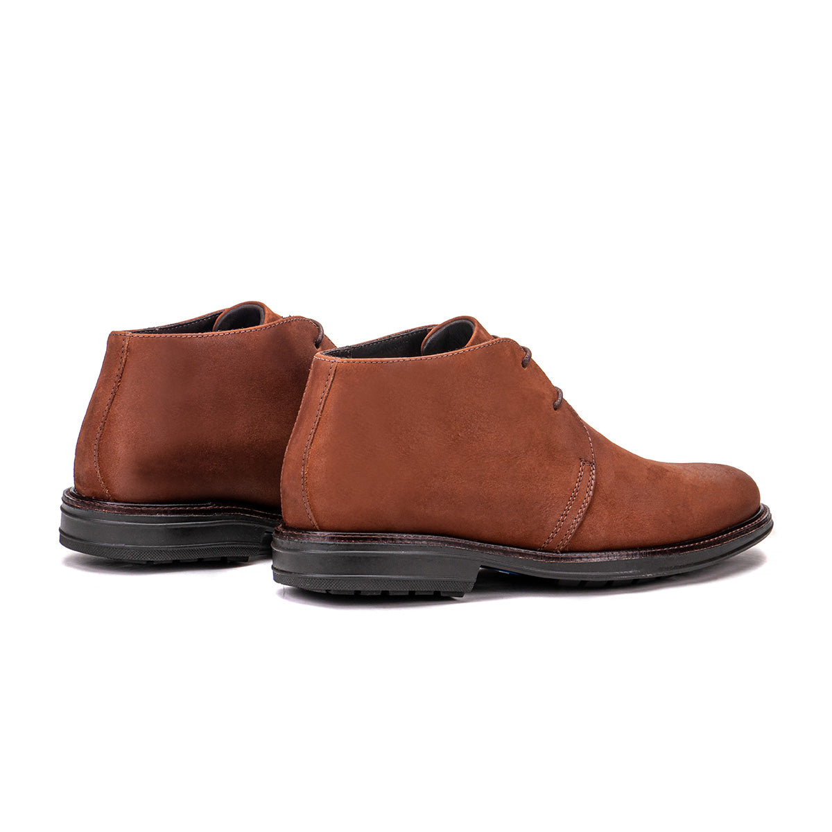 Rear angle of the Artelio Siena natural leather chukka boot showing the heel and leather upper