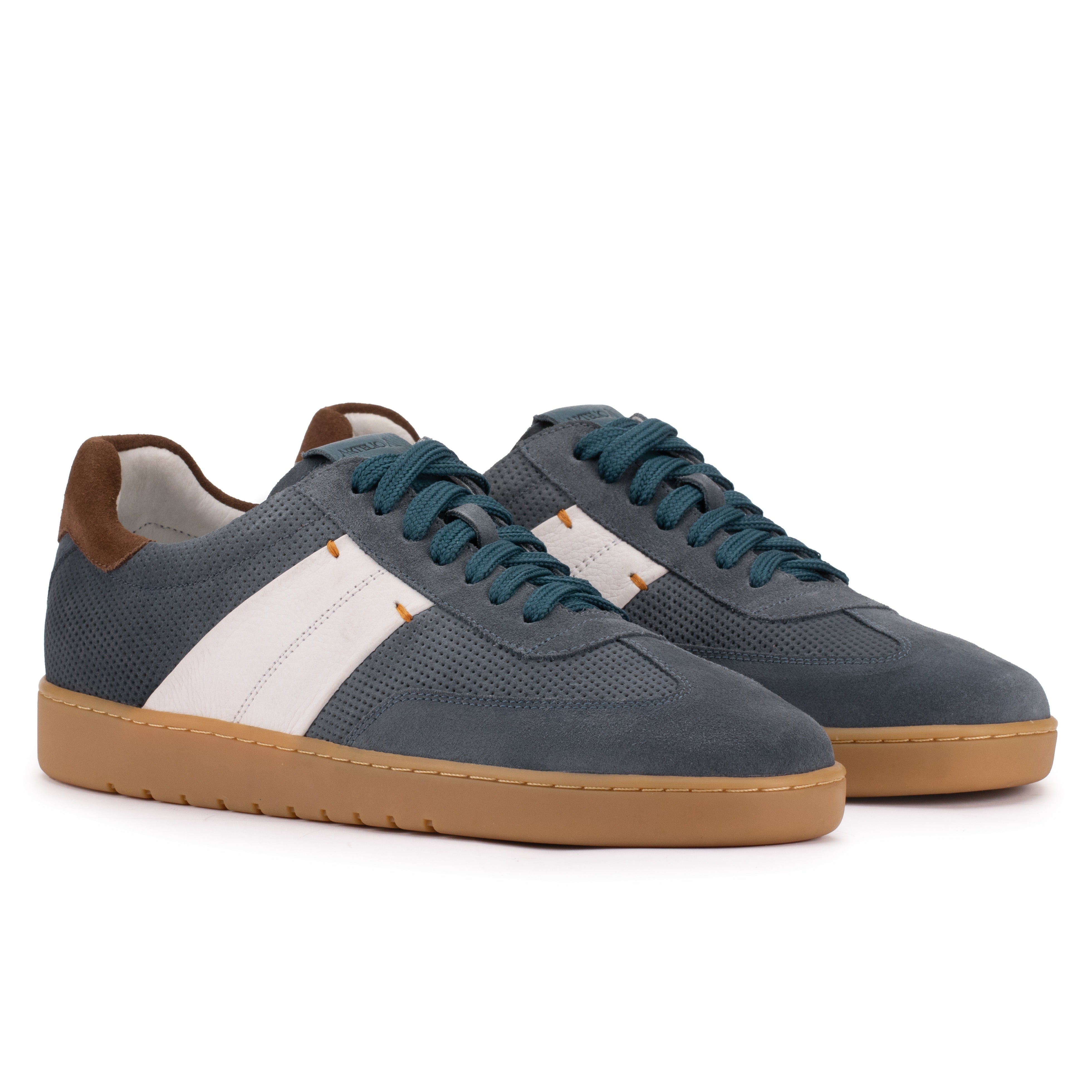 Front angle of the Artelio Strata jeans blue suede sneaker showing the low-profile lace-up shape