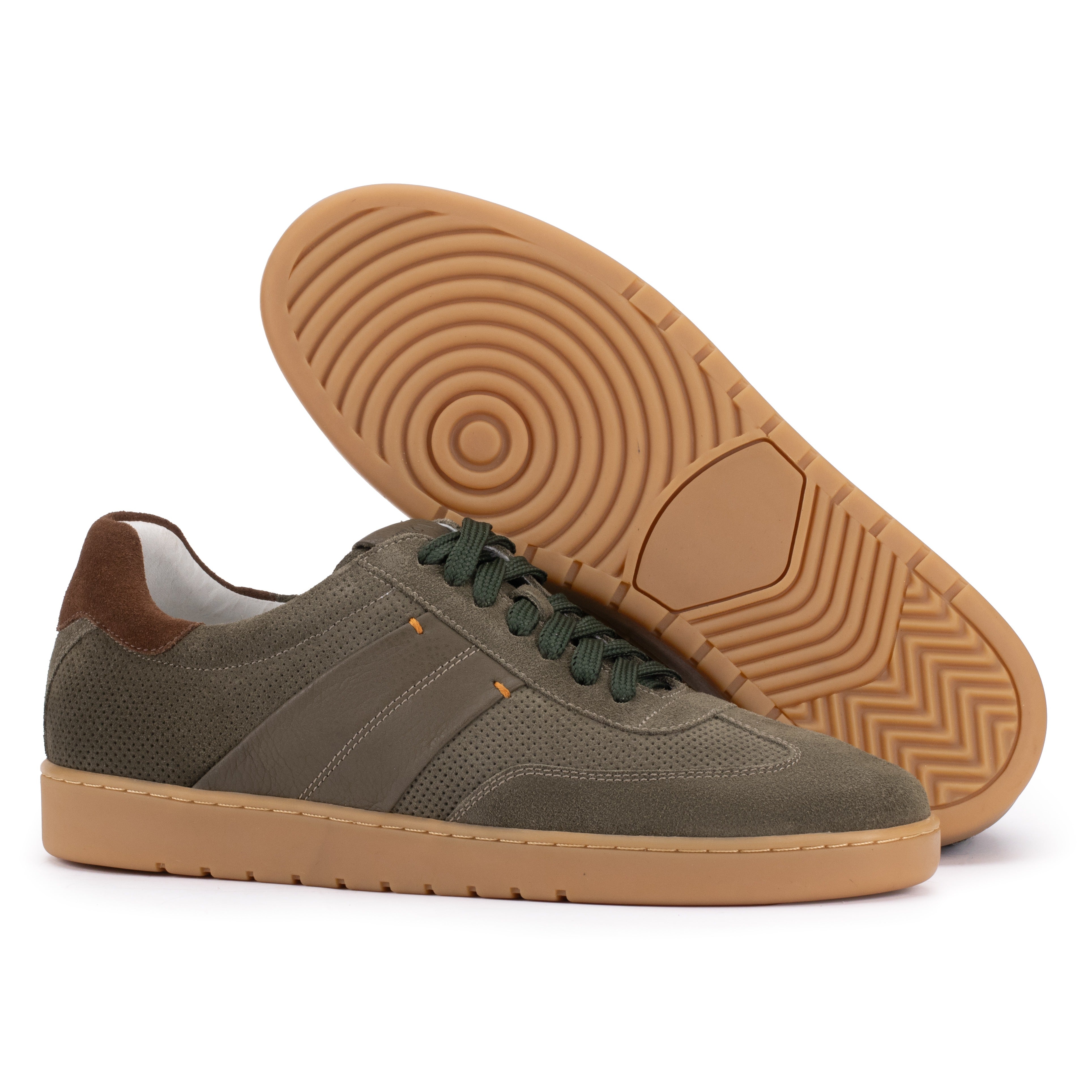 Sole detail of the Artelio Strata olive suede sneaker showing the grippy gum rubber tread