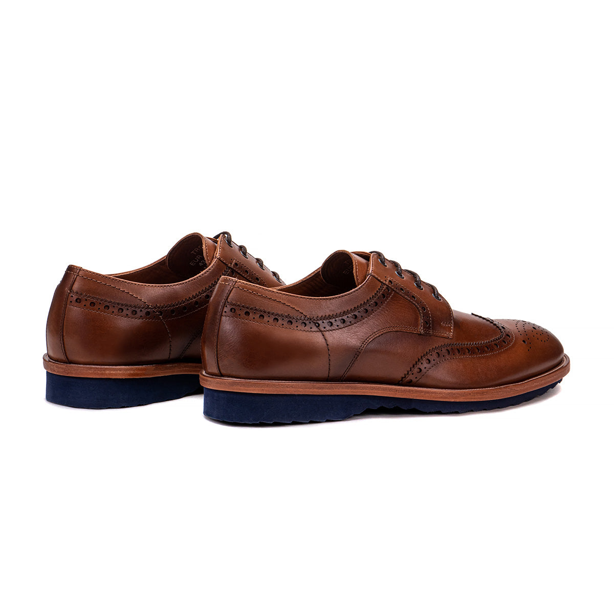 Rear angle of the Artelio Troia brown wingtip brogue dress shoe showing the heel and brown leather finish