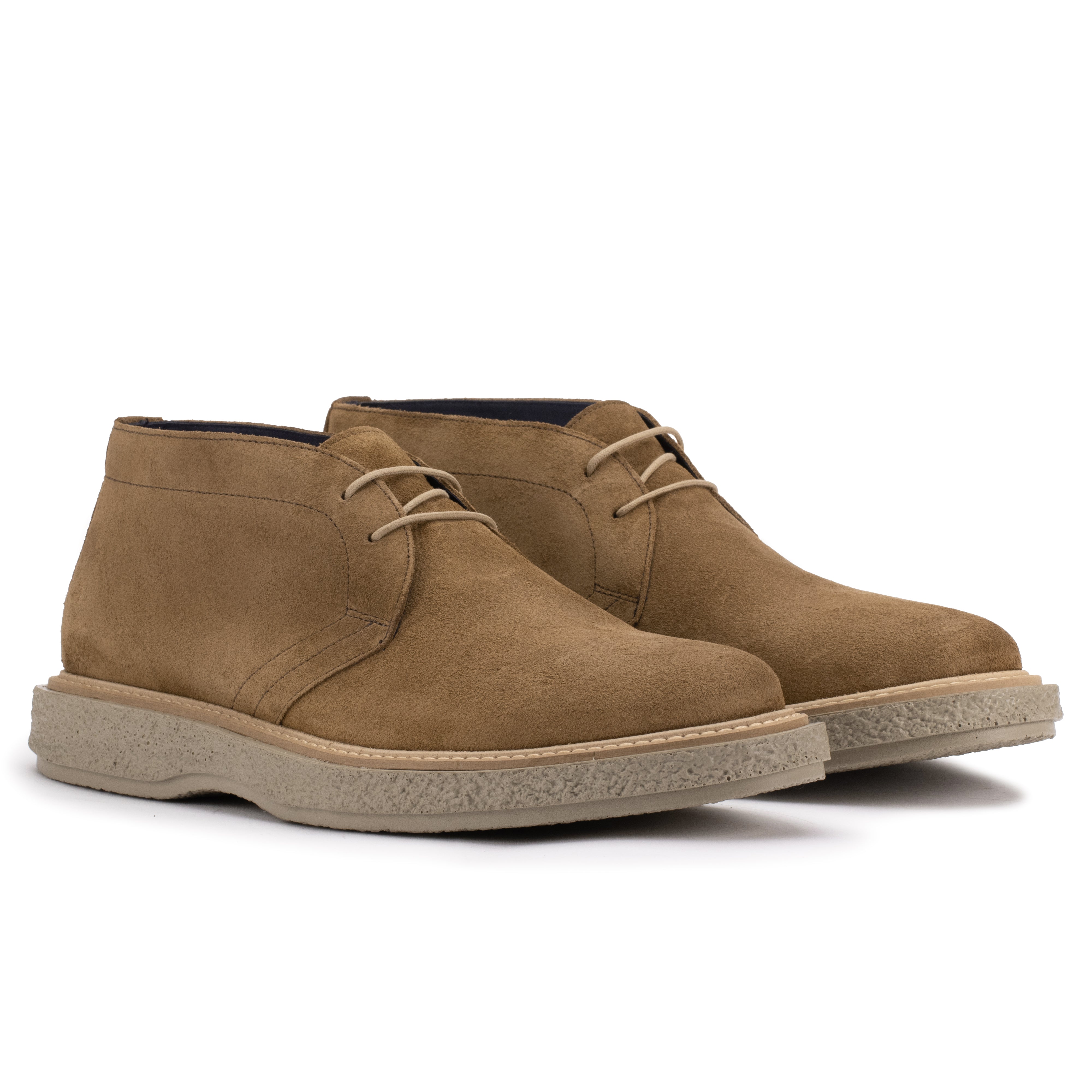 Front angle of the Artelio Vanguardia tobacco suede chukka boot showing the rounded toe and lace-up shape